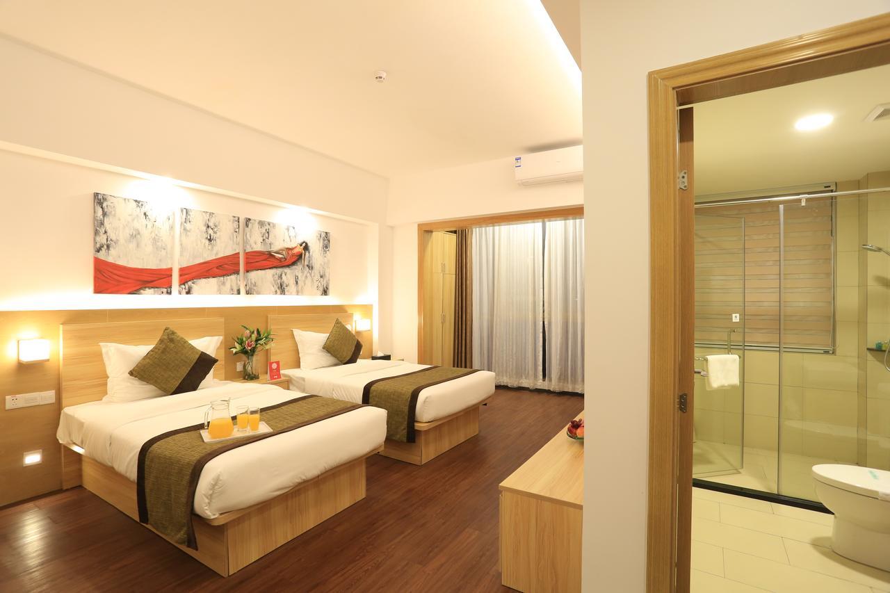 Oyo8001 Tiandi Hotel Shenzhen Esterno foto